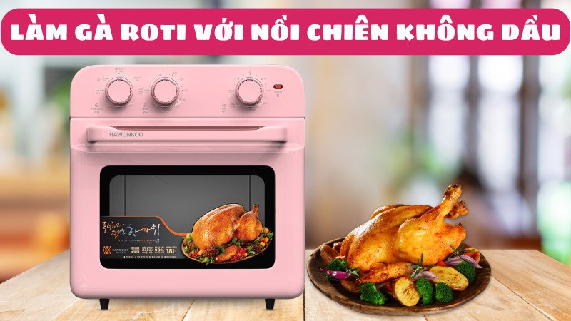Gà roti vàng óng được nướng bằng nồi chiên không dầu, đặt trên đĩa cùng rau thơm và chanh.