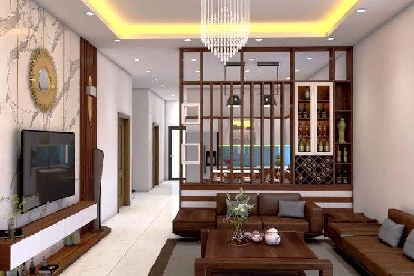 Kệ gỗ trang trí tường phòng khách giúp không gian sinh hoạt trở nên ấm cúng và nổi bật hơn.
