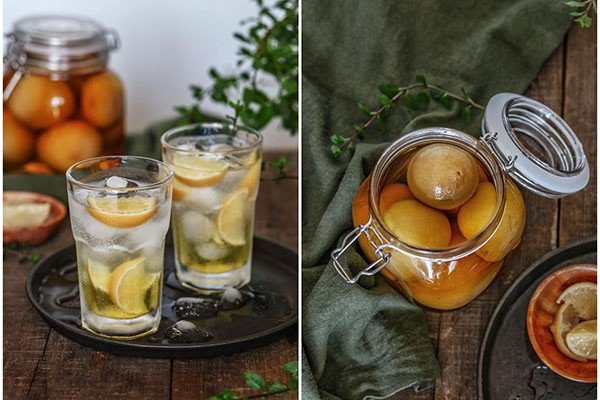 Người phụ nữ hạnh phúc cầm ly chanh muối mát lạnh, thể hiện lợi ích giải khát của chanh muối