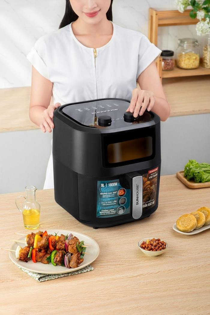 Núm xoay điều chỉnh nhiệt độ và thời gian trên nồi chiên không dầu cơ