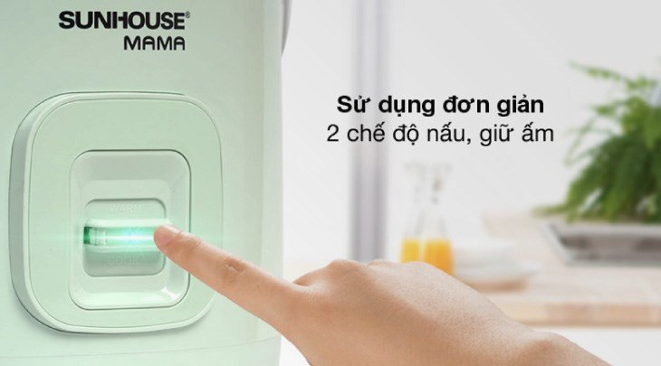 Bật nút nấu cơm trên nồi cơm điện