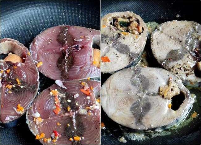 Cá ngừ đang được chiên vàng trong chảo dầu để chuẩn bị làm bún cá