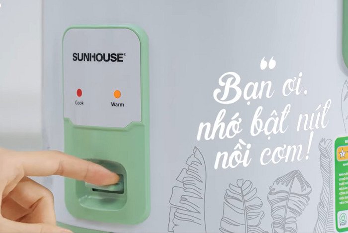 Gạt cần gạt xuống chế độ “Nấu/Cook” để tiến hành nấu cháo
