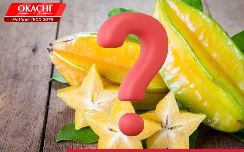 Hình ảnh một trái khế cắt lát cùng với dấu hỏi, tượng trưng cho việc giải đáp các thắc mắc về 100g khế ngọt bao nhiêu calo và công dụng của nó