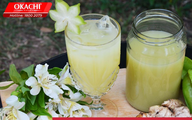 Ly nước ép khế giảm cân thanh mát với những lát khế tươi trang trí, minh họa món đồ uống hỗ trợ kiểm soát 100g khế ngọt bao nhiêu calo hiệu quả
