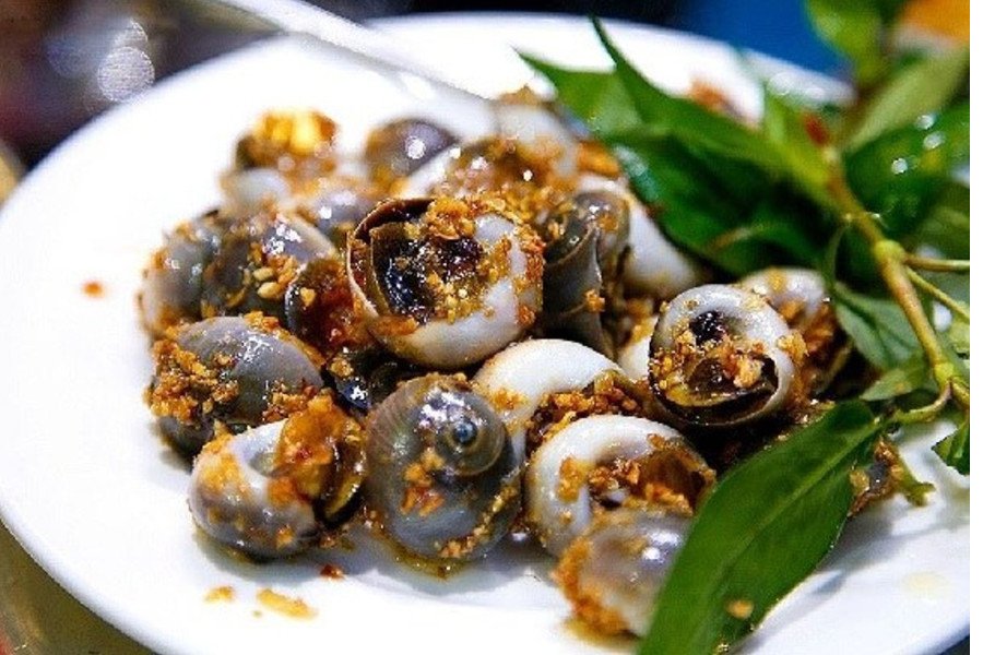 Món ốc đá núi xào bơ tỏi thơm lừng, hấp dẫn với màu sắc bắt mắt