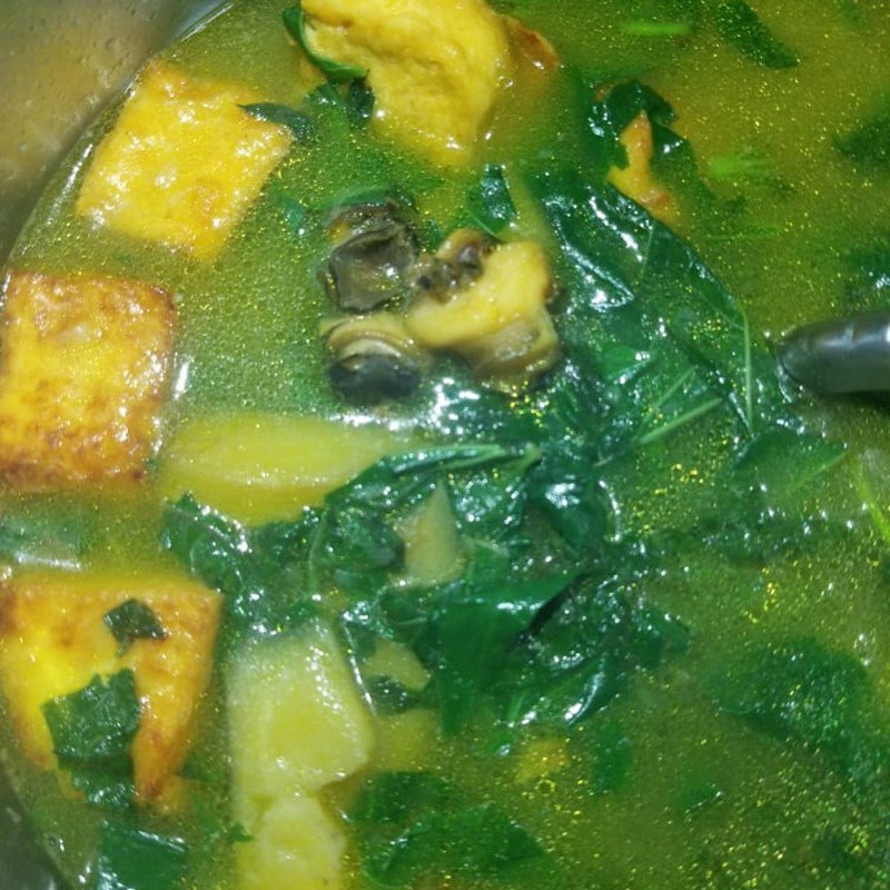 Nấu ốc chuối đậu trong nồi