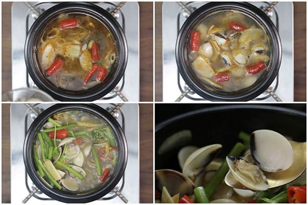 Nghêu đang được hấp cùng gia vị Thái trong nồi trên bếp