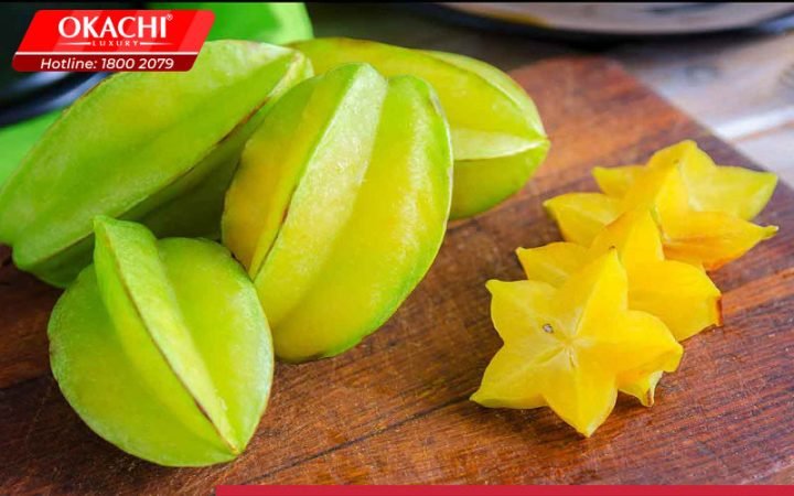 100g Khế Ngọt Bao Nhiêu Calo? Giải Mã Dinh Dưỡng Từ A-Z Quả khế tươi mọng nước đang được bổ đôi để thể hiện hình dạng ngôi sao và hàm lượng calo thấp lý tưởng cho chế độ ăn kiêng