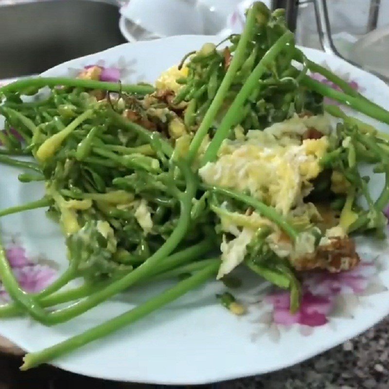 Thành phẩm hoa đu đủ đực xào trứng gà vàng óng